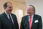 Acting Secretary of Labor Seth Harris chats with Stephen Embry, SIS/BA ’71, on April 26.